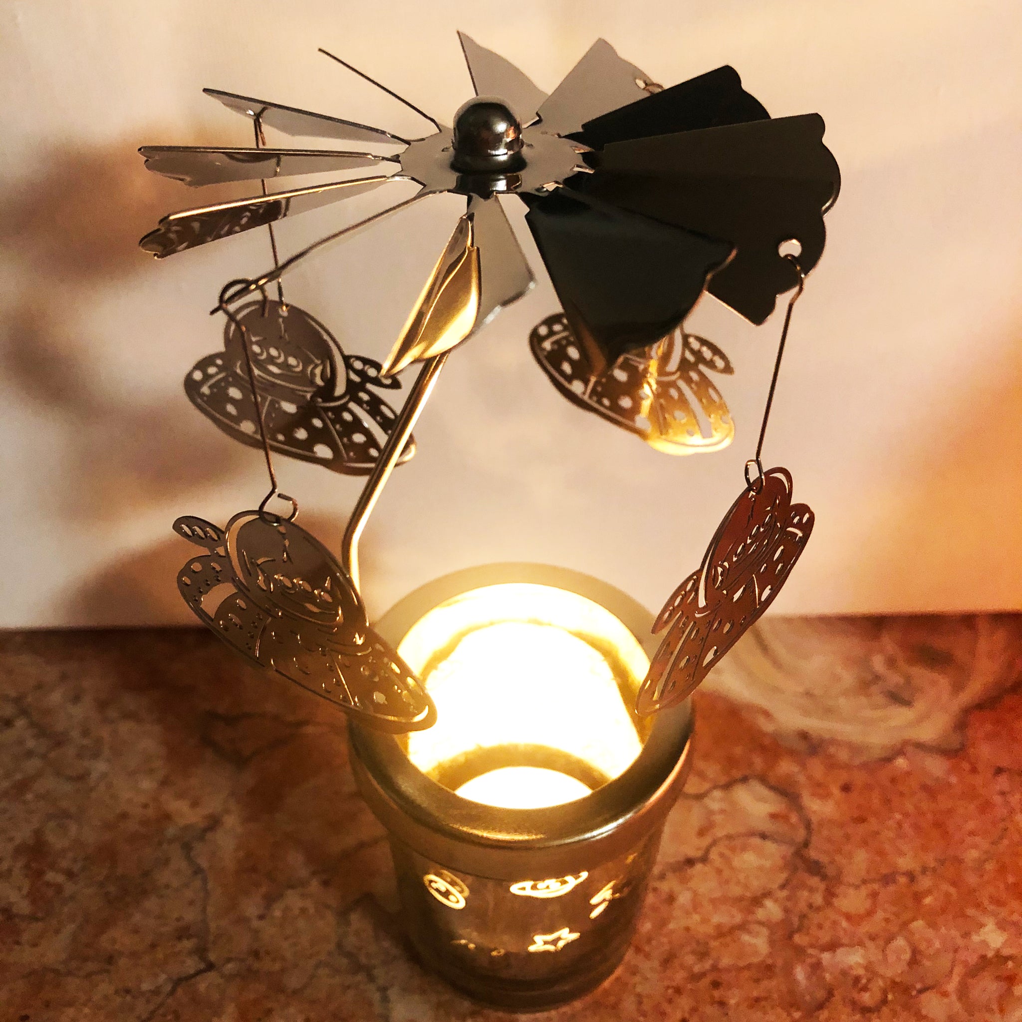 Rotating tea light holder sales